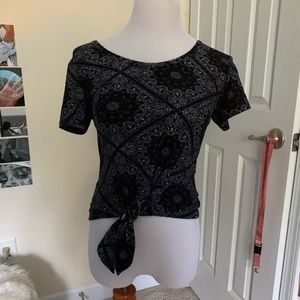 Top with a tie in front